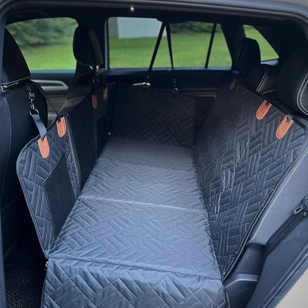 Full view of Pawsely Pup-tastic Car Backseat Cover & Extender installed in a vehicle, showcasing the protective coverage.